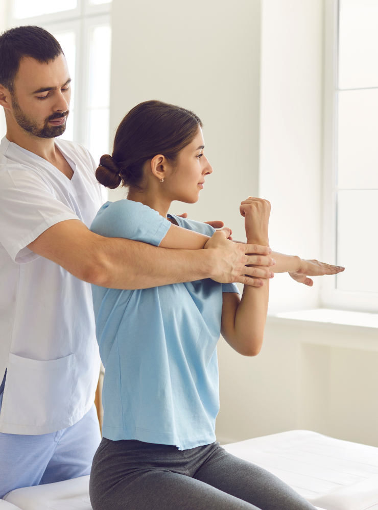 Physiotherapist performing hands-on manual therapy